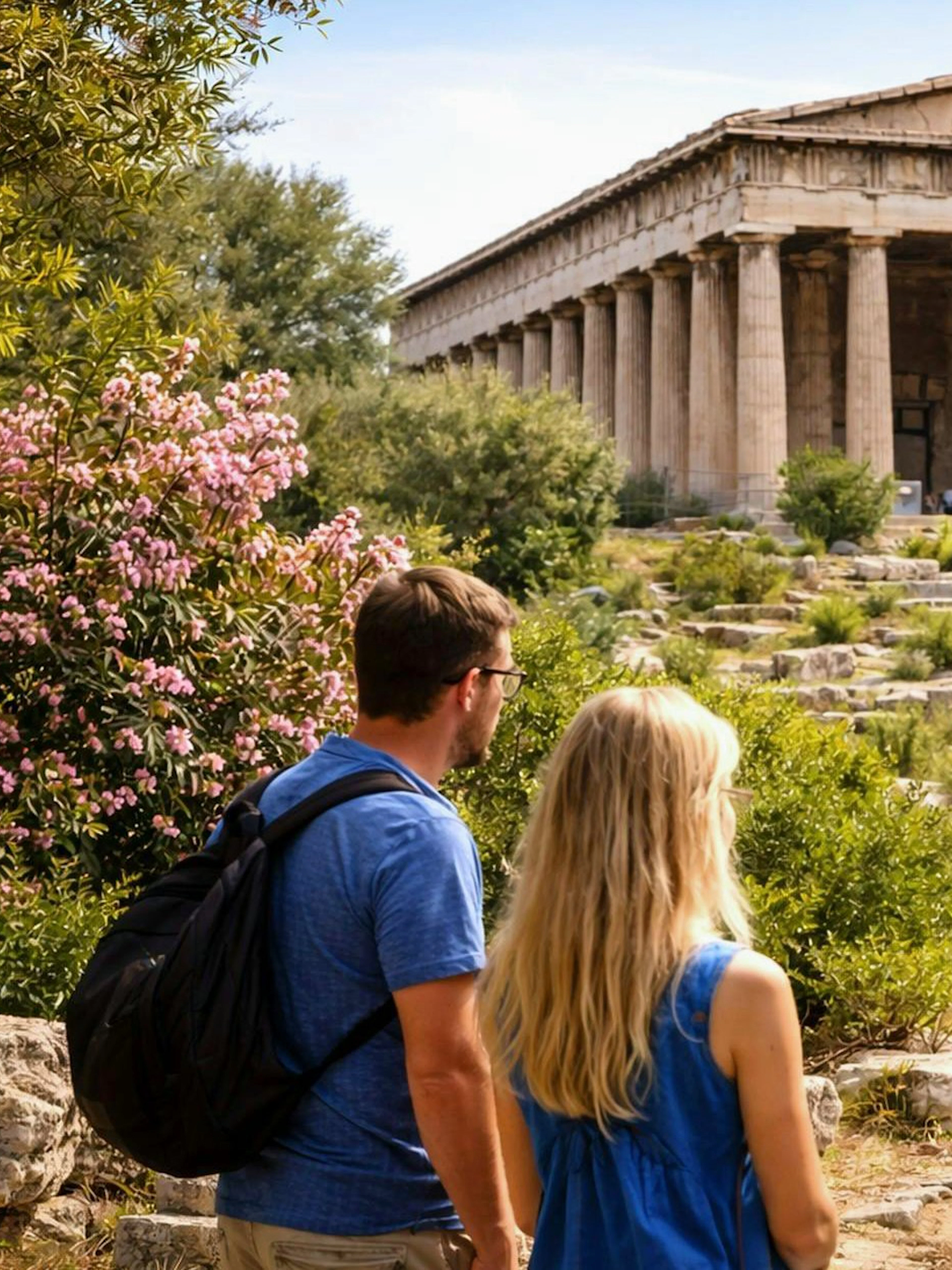 Tour group exploring the Temple of Hephaestus in Athens' Ancient Agora.