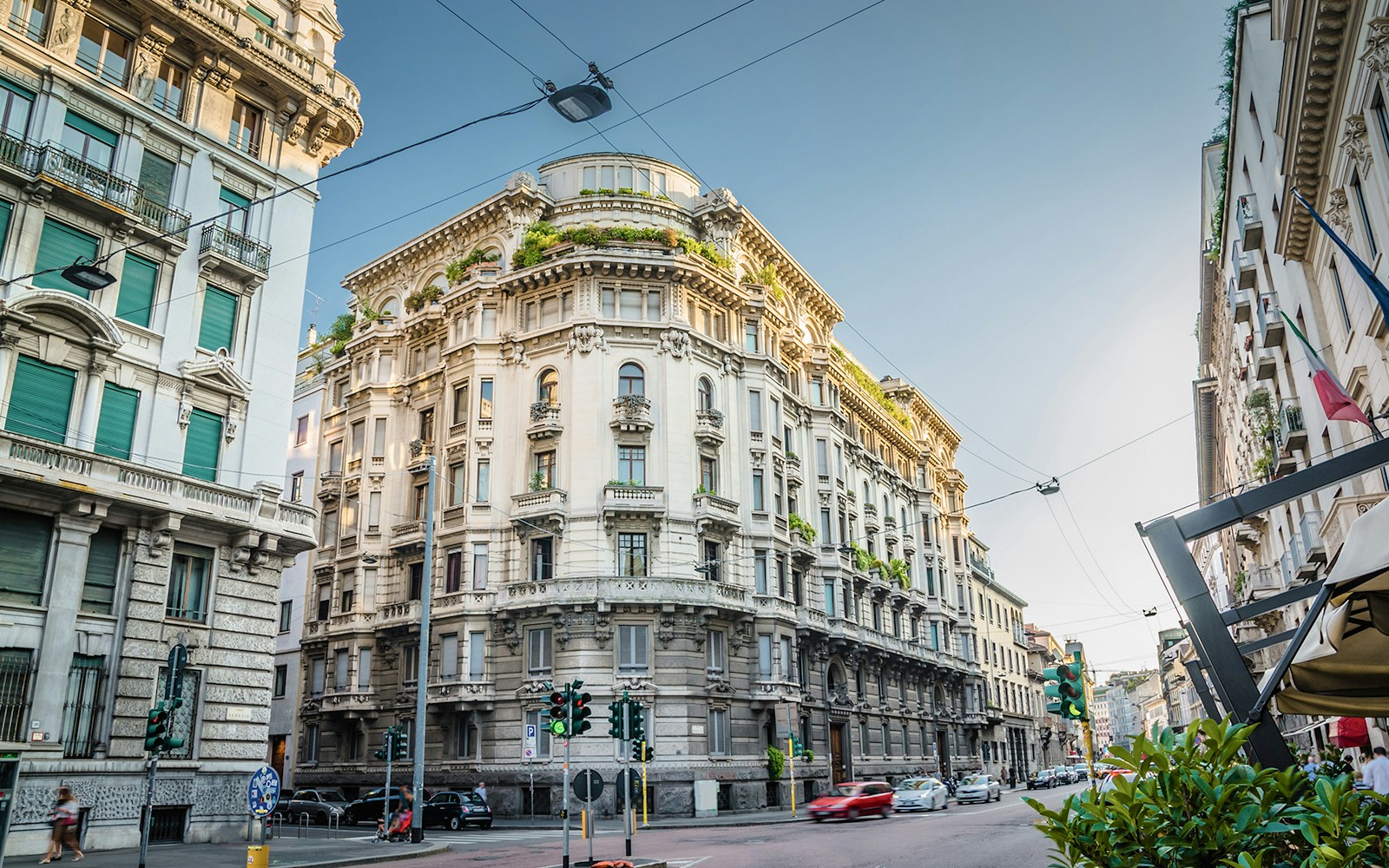 Old typical building with balconies in centre of Milan, Italy