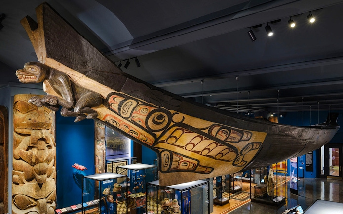 Carved and painted canoe exhibit at the American Museum of Natural History.