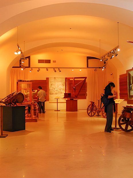 Exhibit of Leonardo da Vinci's inventions at the museum, featuring models and sketches.