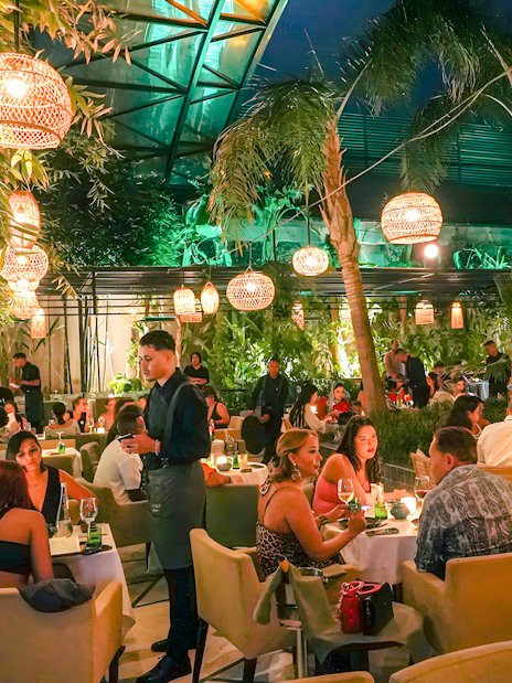 Performer entertaining guests at Nouba Restaurant Dinner Show.