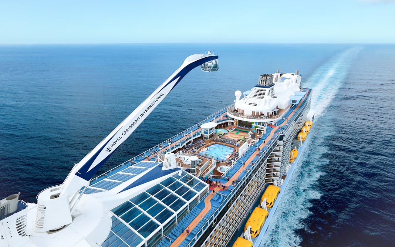 Royal Caribbean's Anthem of the Seas cruise ship sailing with pool deck view.