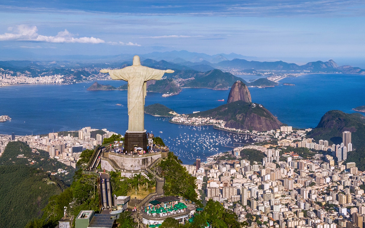 Aerial view of Christ the Redeemer, Sugarloaf Mountain, and Rio de Janeiro cityscape, Brazil.