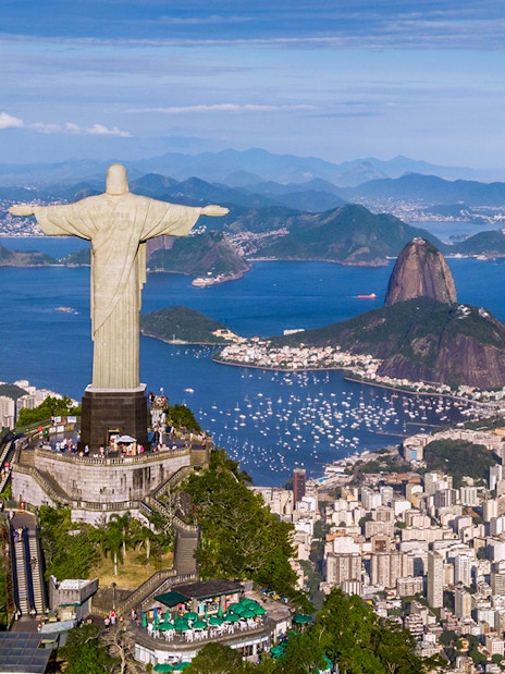 Aerial view of Christ the Redeemer, Sugarloaf Mountain, and Rio de Janeiro cityscape, Brazil.