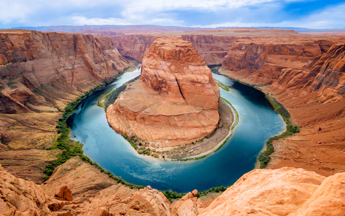 Horseshoe Bend view with Colorado River, part of Secret Antelope Canyon & Horseshoe Bend Tour.