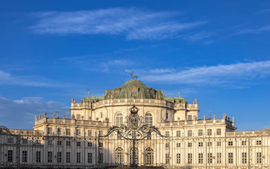 Hunting Lodge of Stupinigi in Turin, Italy, viewed from the ornate front gate.