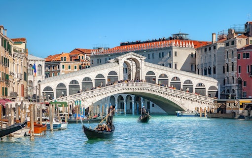 Gondolas on the Grand Canal near Rialto Bridge, Venice.