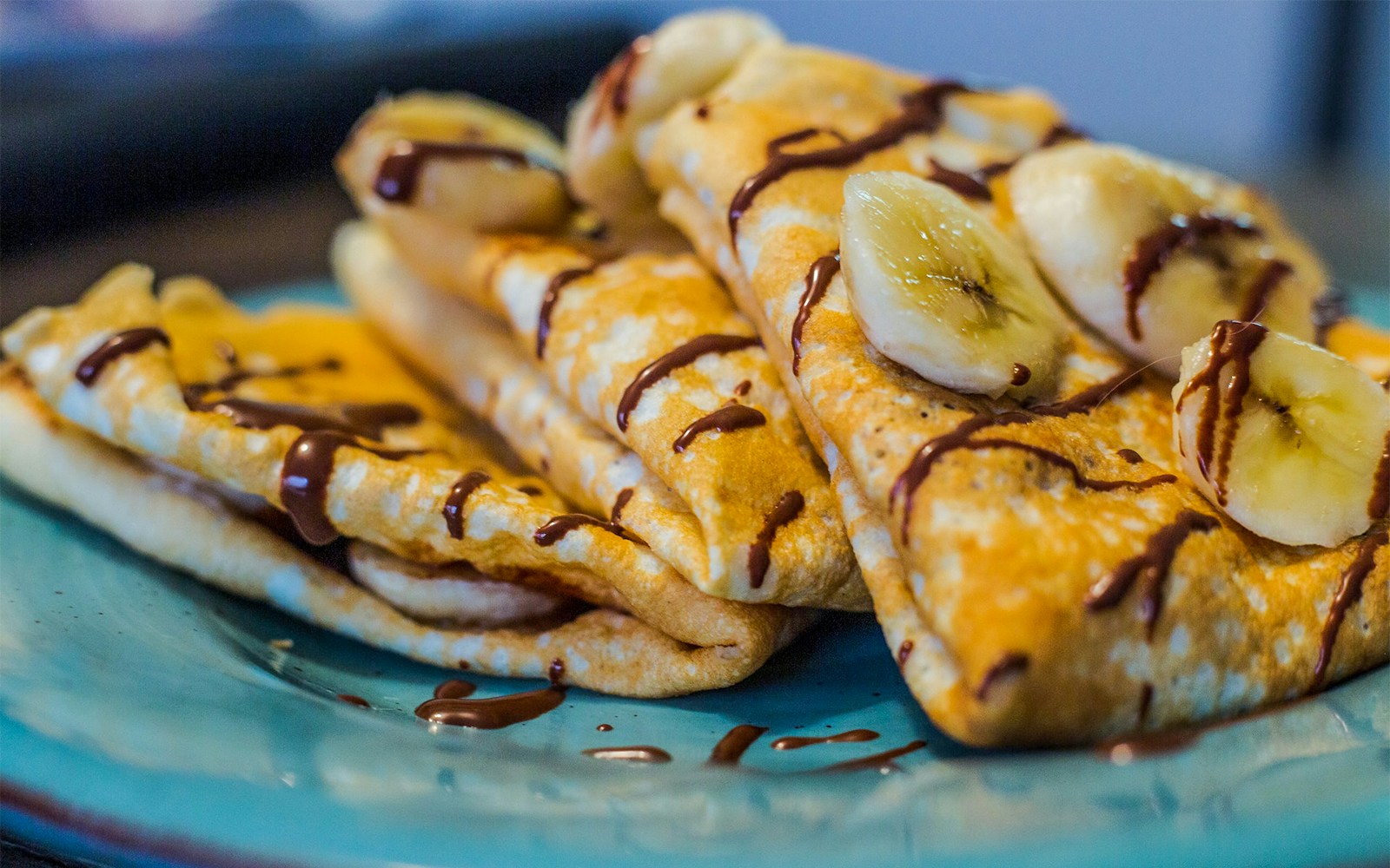Crepes with banana and chocolate drizzle at a Mont Saint Michel restaurant.