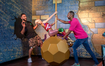 Miley Cyrus wax figure on a wrecking ball at Madame Tussauds Dubai.