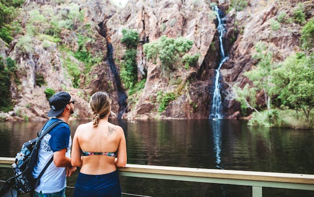 Tourists viewing waterfall at Litchfield National Park, part of Three Days of Top End Highlights.