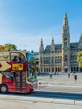Open-top Big Bus tour in front of Vienna City Hall, Austria.