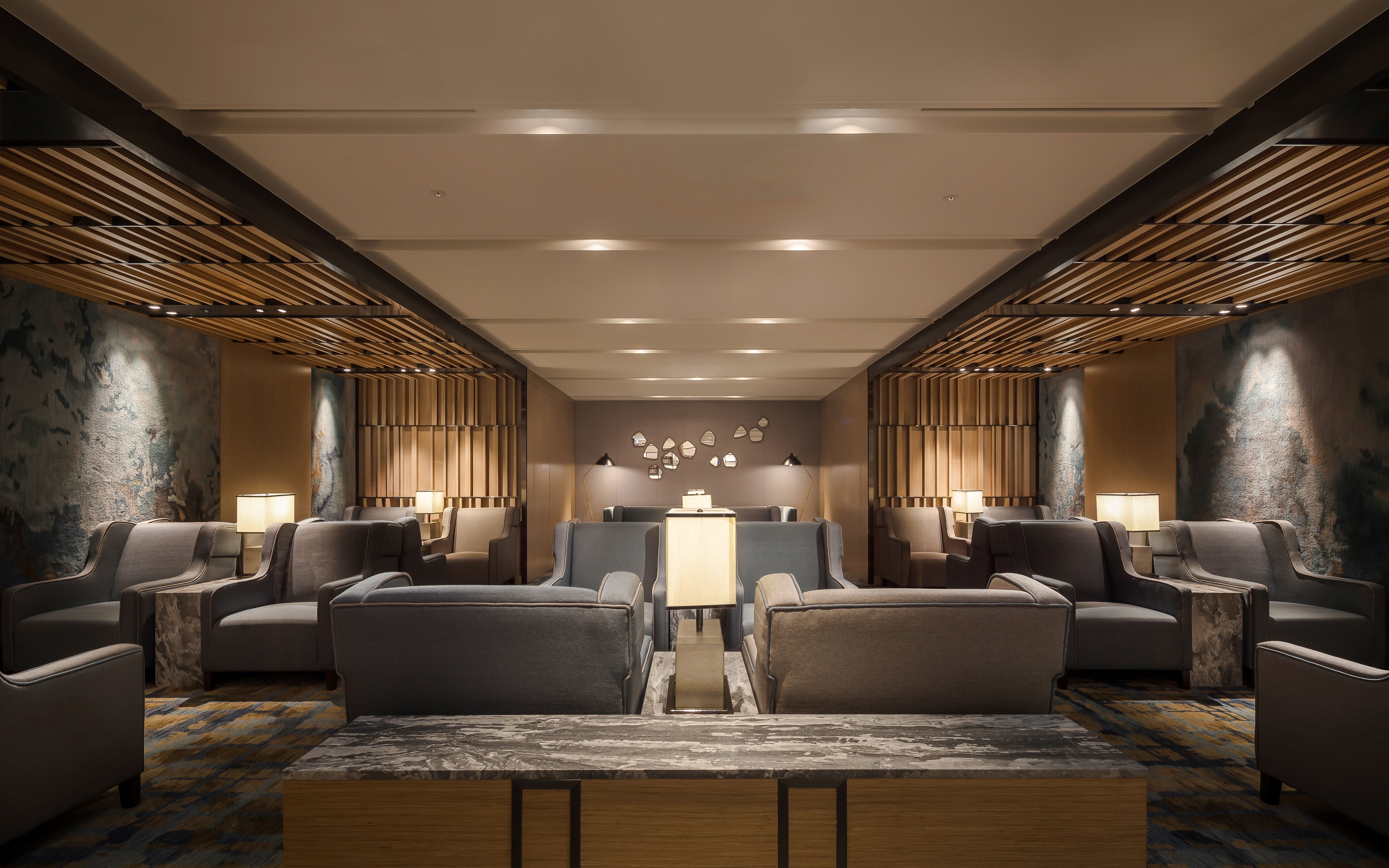 Seating area in Plaza Premium Lounge, Zone C, Taipei, Taiwan with modern decor and ambient lighting.