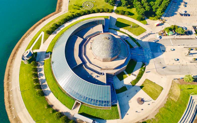 Aerial view of the Adler Planetarium in Chicago near Lake Michigan.