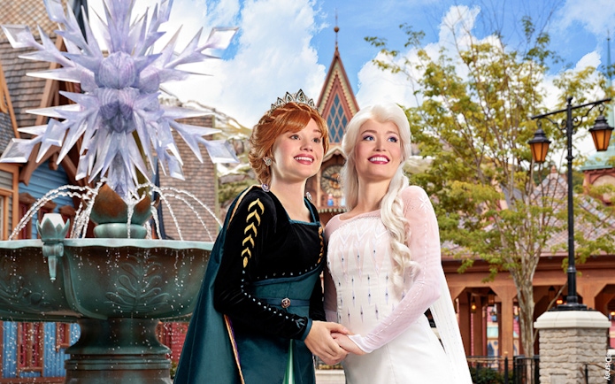 Characters in front of a fountain at Disneyland Paris.