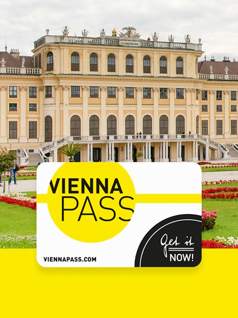 Vienna Pass card in front of Schönbrunn Palace, Vienna, with gardens and visitors.