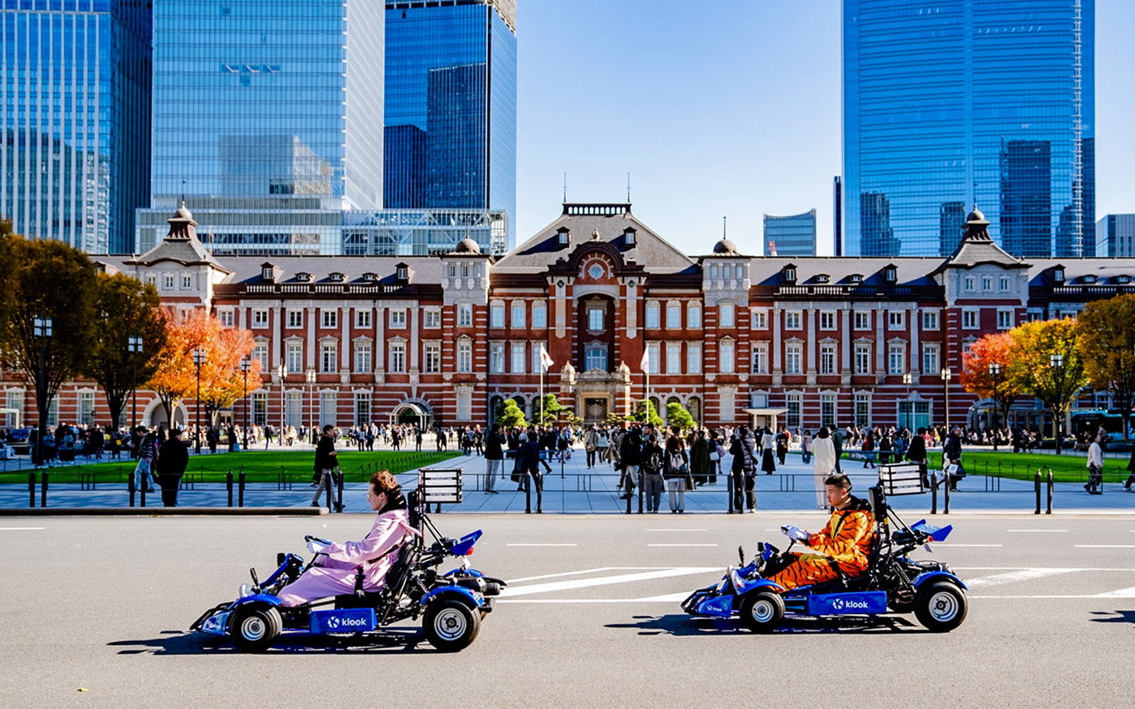Tourists go-karting near Tokyo Station in Shibuya, Japan.