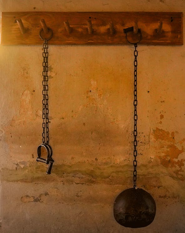 Chains and shackles on a wall at the Medieval Torture Museum.