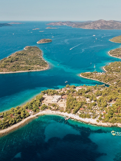 Aerial view of the Blue Lagoon with surrounding islands and clear blue waters.