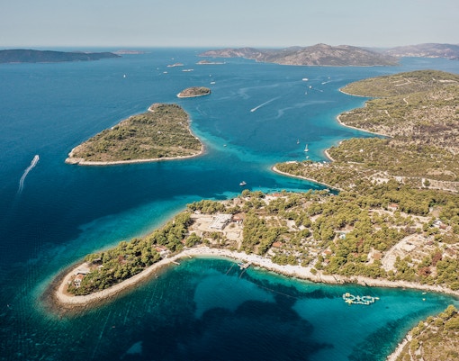 Aerial view of the Blue Lagoon with surrounding islands and clear blue waters.