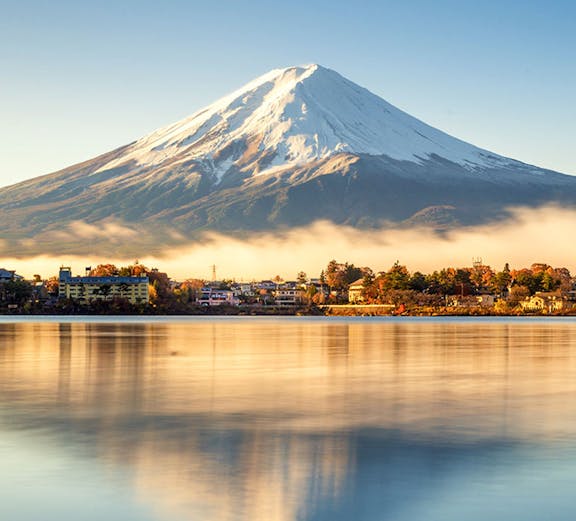 Mount Fuji reflected in a calm lake near Tokyo, Japan.
