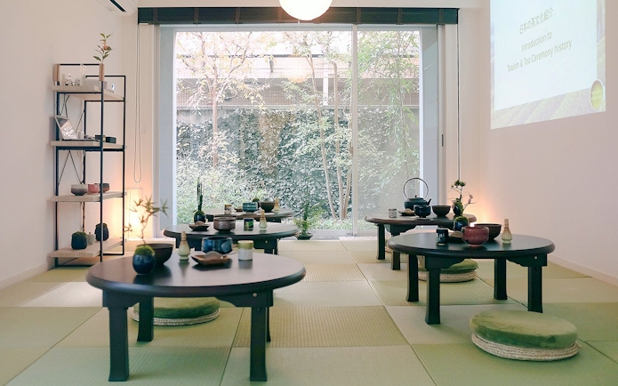Tatami room setup for Tokyo Matcha & Kimono Experience with tea ceremony tables.