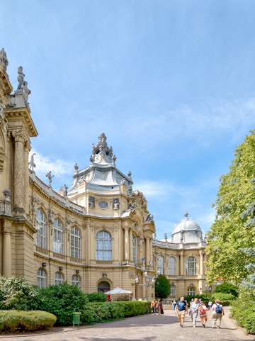 Vajdahunyad Castle Museum facade with visitors, Budapest, Hungary.