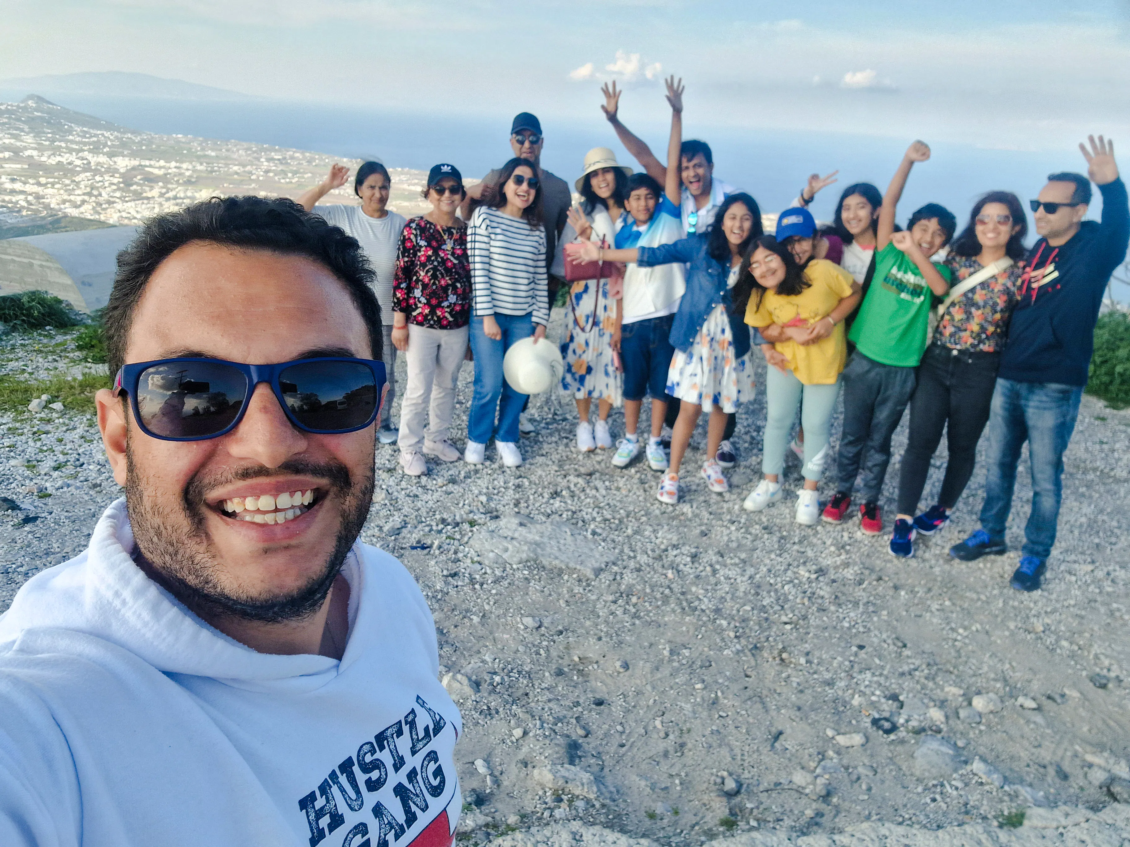 Group enjoying a scenic view during Santorini exploration tour.