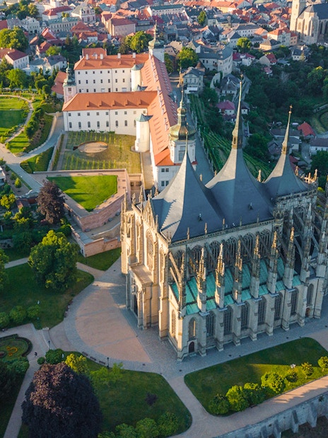 Aerial view of St. Barbara's Church and surrounding gardens in Kutna Hora.