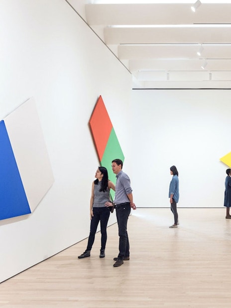 Guests viewing abstract art at Museum of Modern Art, San Francisco.