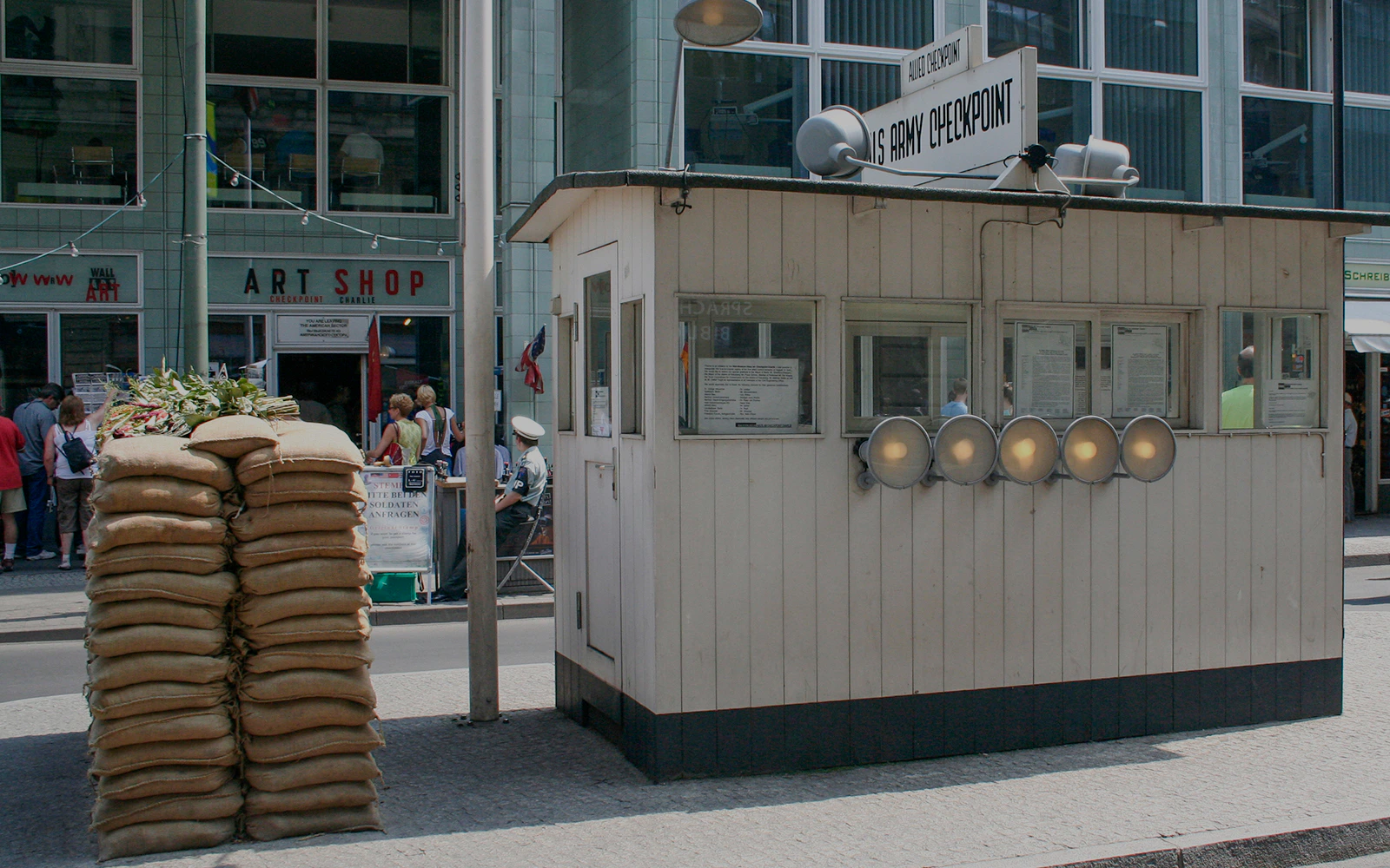 Checkpoint Charlie guardhouse with sandbags in Berlin.