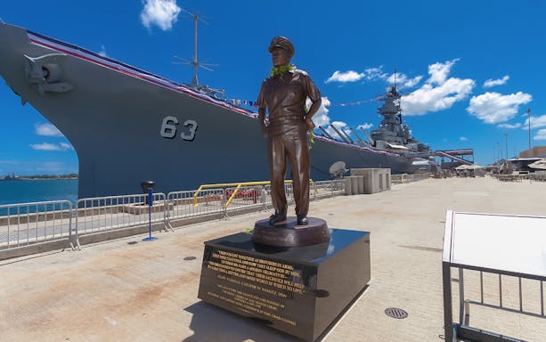 USS Missouri battleship and Admiral Nimitz statue at Pearl Harbor, Oahu.