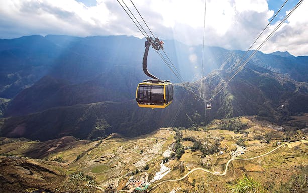 Cable car over terraced fields at Sun World Fansipan, Vietnam.