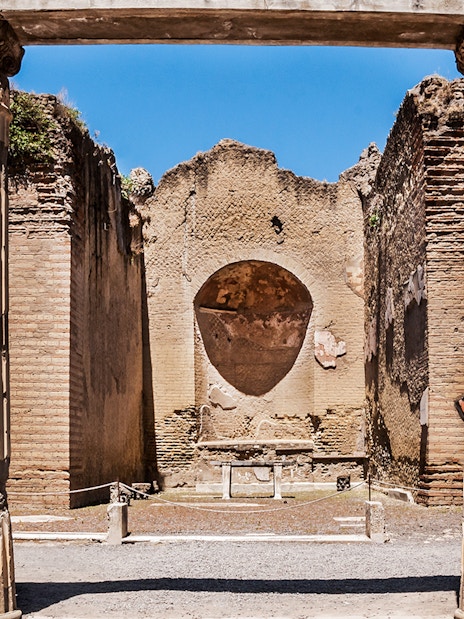 Ancient columns and walls at Herculaneum ruins in Italy.