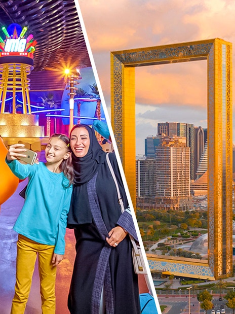 Family enjoying IMG Worlds of Adventure with mascot and Dubai Frame view.