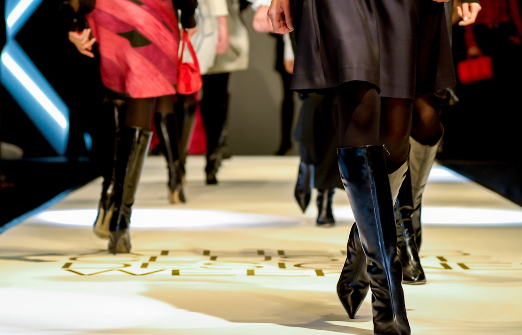Models walking runway at Bangkok Fashion Week showcasing designer collections.