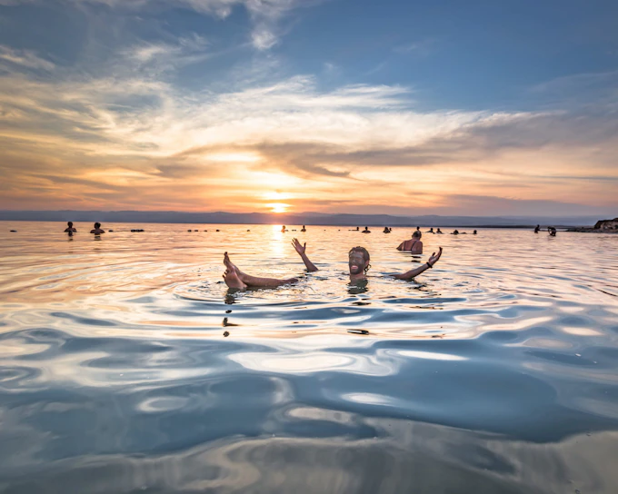 From Amman: Dead Sea Half-Day Trip with 4-Star Resort Beach Access & Mud Experience