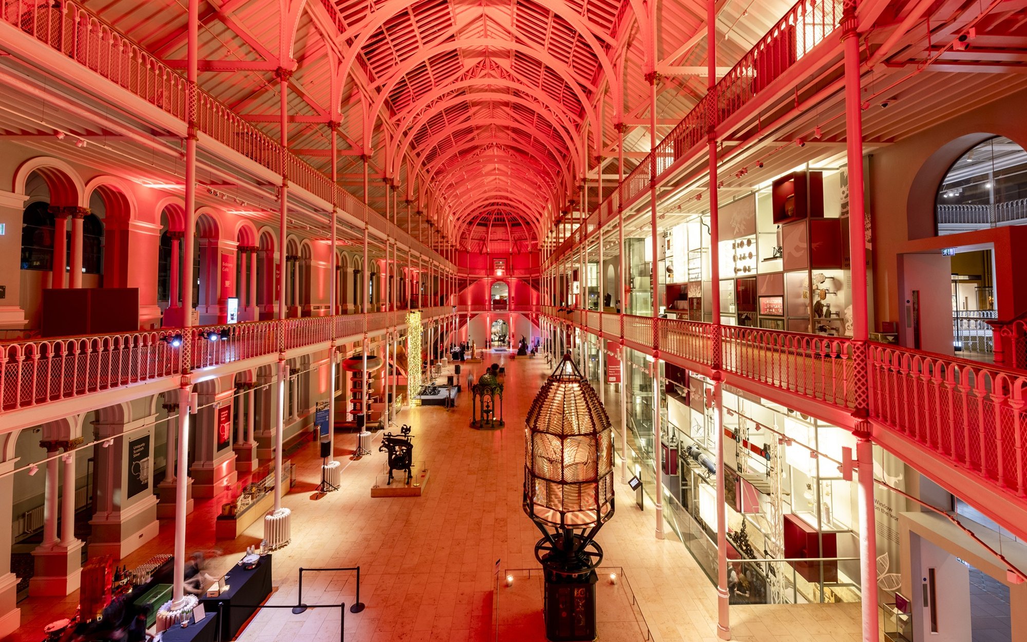 National Museum of Scotland interior with red lighting and exhibits, Edinburgh.