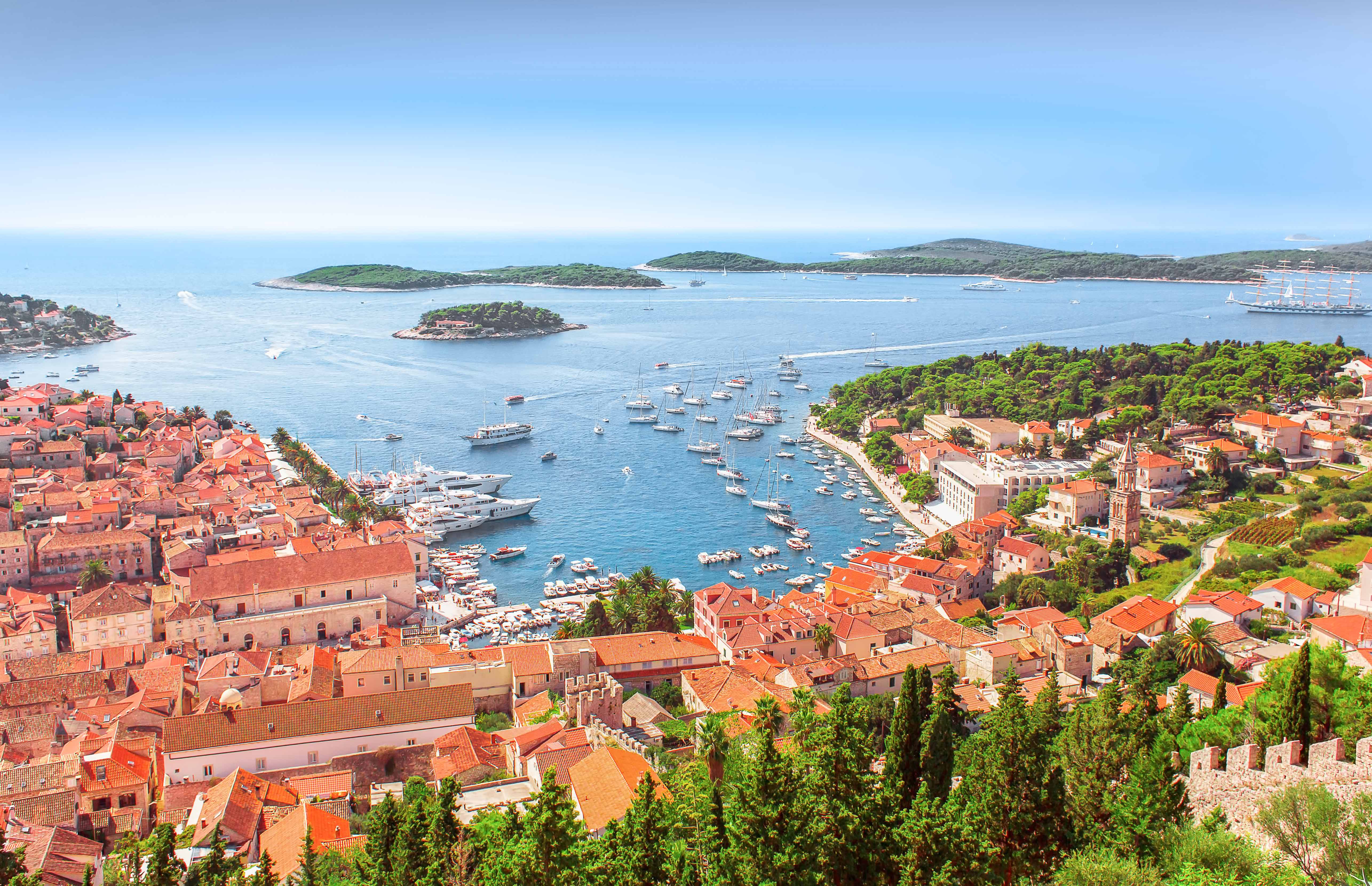 Hvar Island harbor with boats and historic buildings, Croatia.