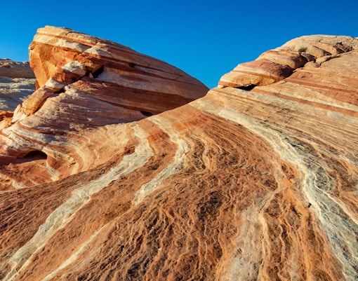 Rock formations with red and white stripes at Valley of Fire State Park.