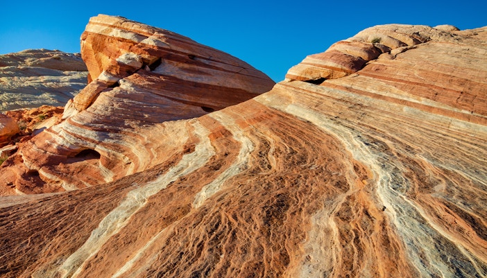 Rock formations with red and white stripes at Valley of Fire State Park.