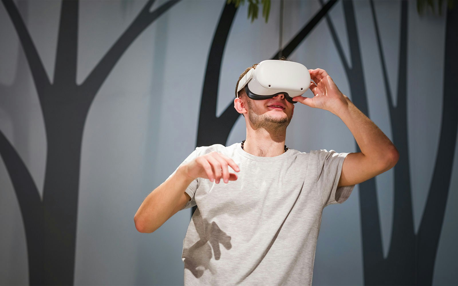 Man using VR headset at Doha Quest.