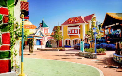 Colorful buildings and signs in Energylandia Theme Park, Zator, near Krakow, Poland.