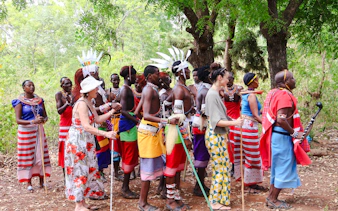 Maasai group performing traditional dance at Diani Beach cultural tour.