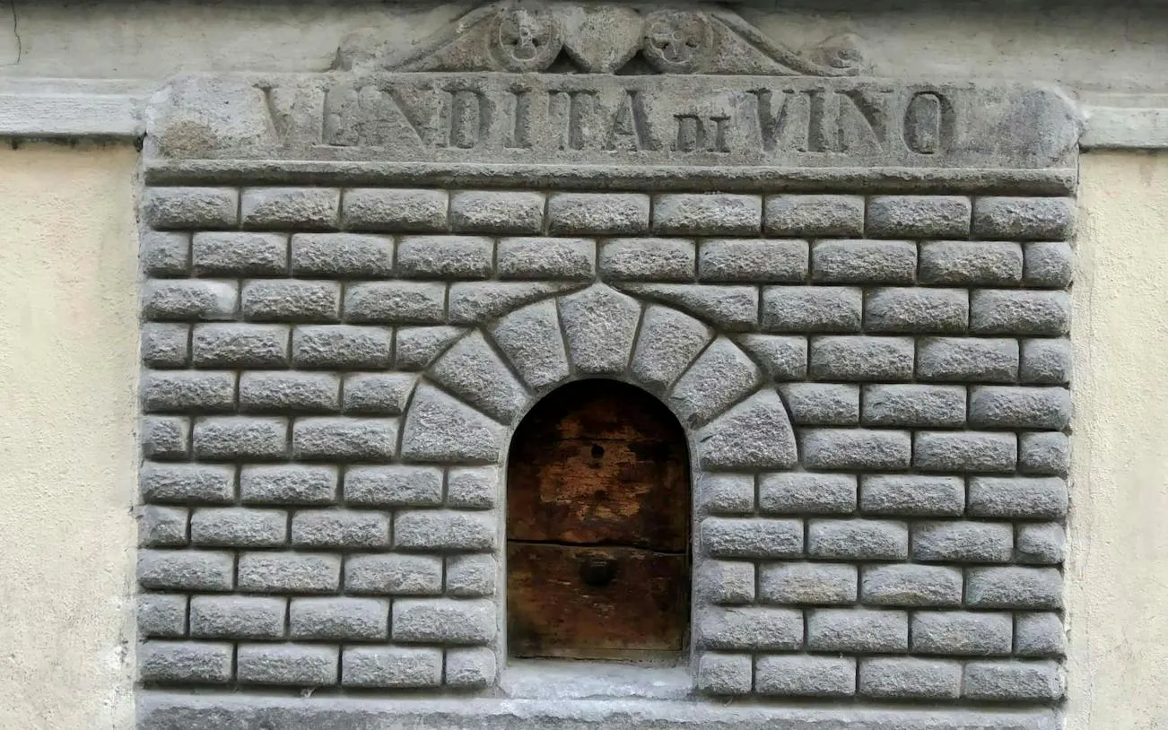Wine window in Florence, part of the Detective Mystery self-guided city exploration game.