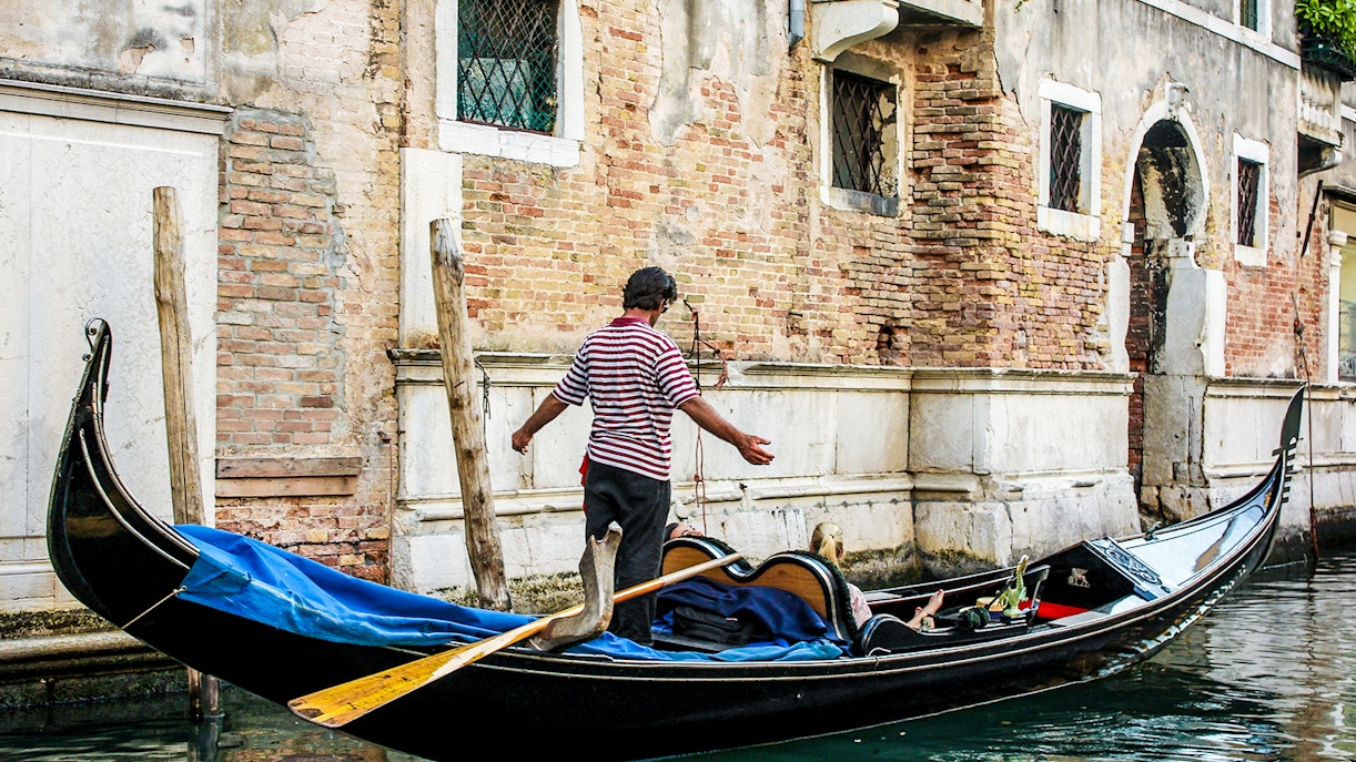 Gondola in Venice with guy singing to passengers - Serenade
