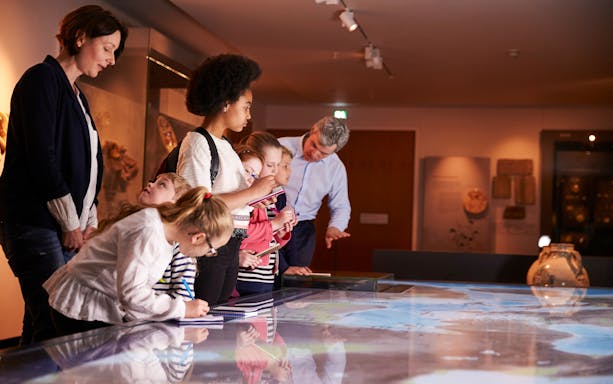 Visitors exploring exhibits at the Egyptian Museum during a private tour in Cairo.
