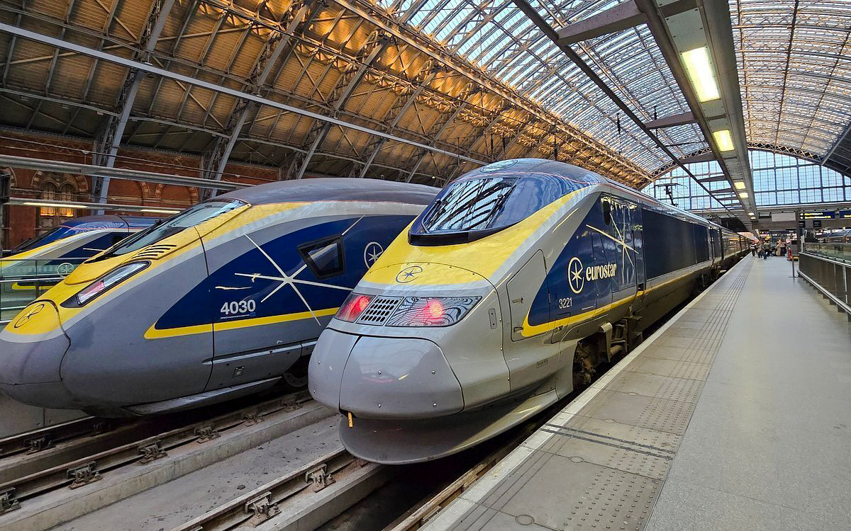 Eurostar train at international railway station platform.