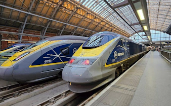Eurostar train at international railway station platform.