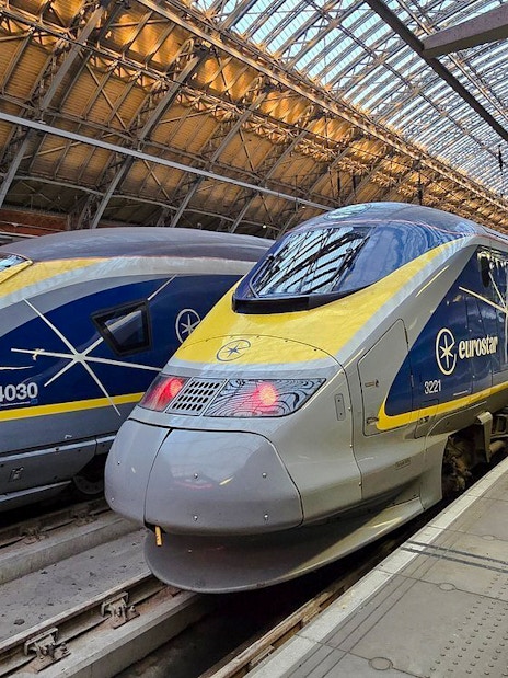 Eurostar train at international railway station platform.