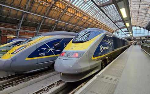 Eurostar train at international railway station platform.